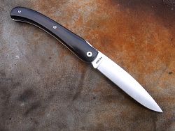Couteau LOU PALOUMAYRE avec un manche en bois d'ébène grenadille (brun et veiné).