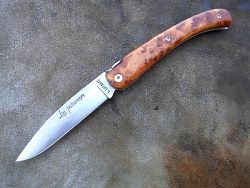 Couteau LOU PALOUMAYRE avec un manche en racine de thuya.