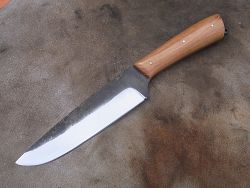 Couteau L.LATASTE manche en vieux robinier avec volute forgée dans la masse, lame en acier forgé.