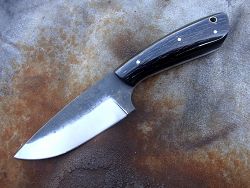 Couteau L.LATASTE manche en morado avec lame en acier forgé.