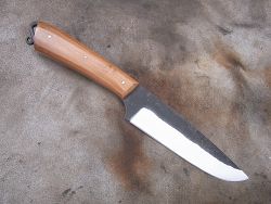 Couteau L.LATASTE manche en vieux robinier avec volute forgée dans la masse, lame en acier forgé.