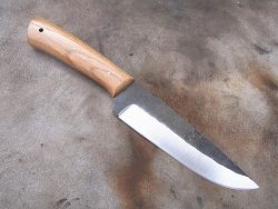 Couteau L.LATASTE manche en ivoire de phacochère avec lame en damas forgé.