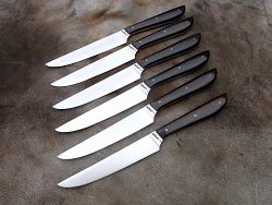 Couteaux de table L.LATASTE coffret manches en ébène avec lames en acier inoxydable.