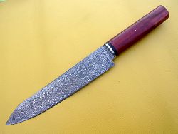 Couteau de cuisine en damas forgé.