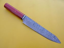 Couteau de cuisine en damas forgé.