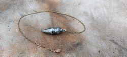 Pendule damas forgé L.LATASTE avec perle en ivoire de mammouth fossilisé.